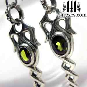 silver-dripping-celtic-earrings-green-peridot-stones